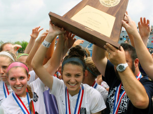 Greg Ford/C&SMediaTexas The Wylie East girls’ soccer team and head coach Kody Christensen celebrate their state championship victory last April in Georgetown. The Lady Raiders upended Austin Vandegrift 1-0, avenging a 2014 state title game defeat and earning the school its first state championship.