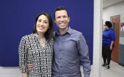 Couple work in concert in classroom, married life