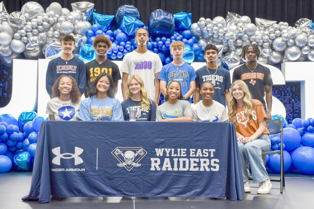 Twelve Raiders sign with colleges on signing day